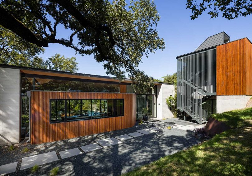 A Modern Home In Austin With A Pool That Bisects The House
