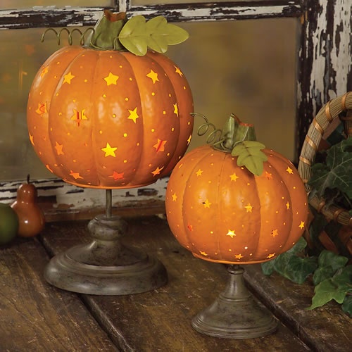 Pumpkins With Cutout And Painted Stars On Stands Will Make Your Fall Home Look Dreamy And Romantic