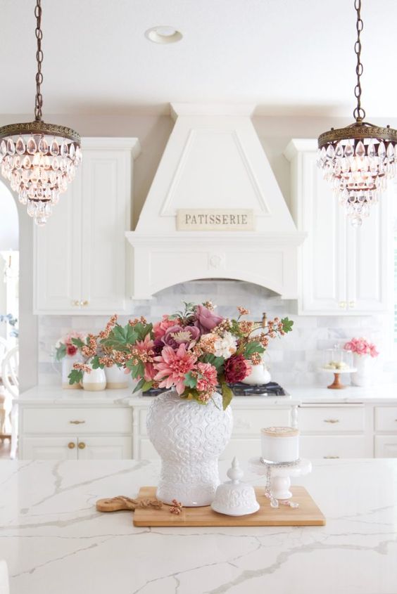 A Chic Monochromatic Floral Centerpiece Of Pink, Dusty Pink, Burgundy And White Blooms And Greenery For The Fall