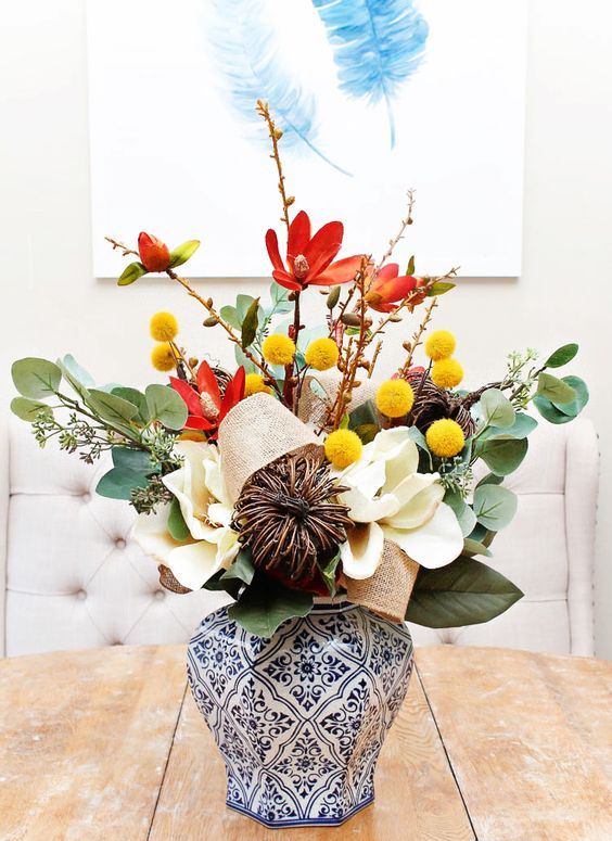 An Elegant Fall Arrangement Of Leaves, Billy Balls, Vine, Burlap And Faux White Blooms Is Amazing For Decor