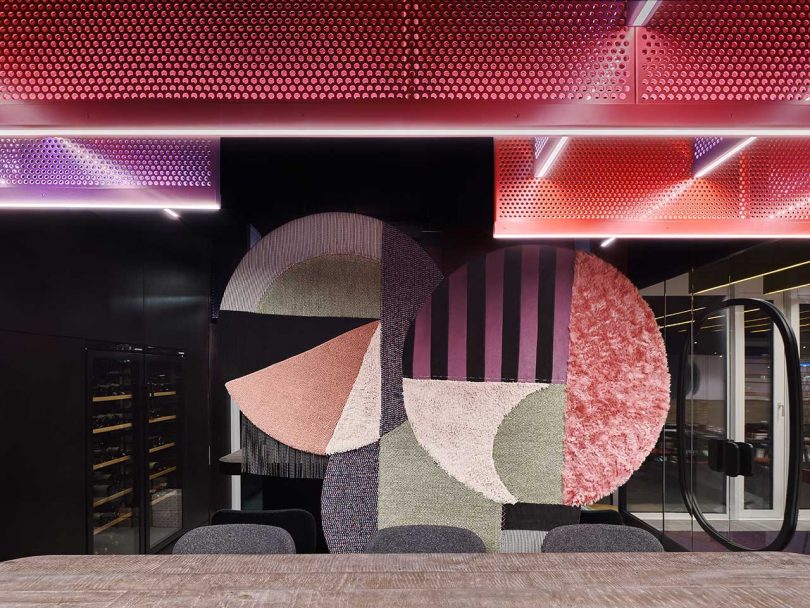 A Restaurant With A Fresh, Colorful Design Featuring Carpet Collages