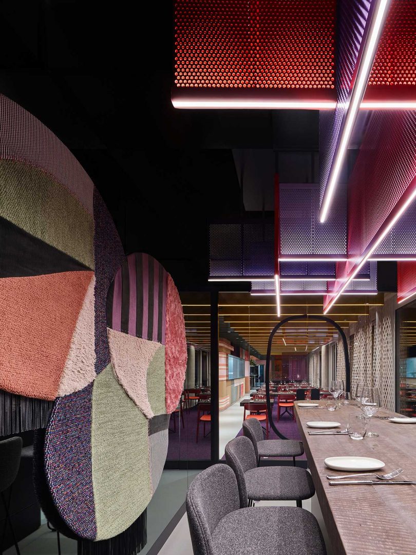 A Restaurant with a Fresh, Colorful Design Featuring Carpet Collages