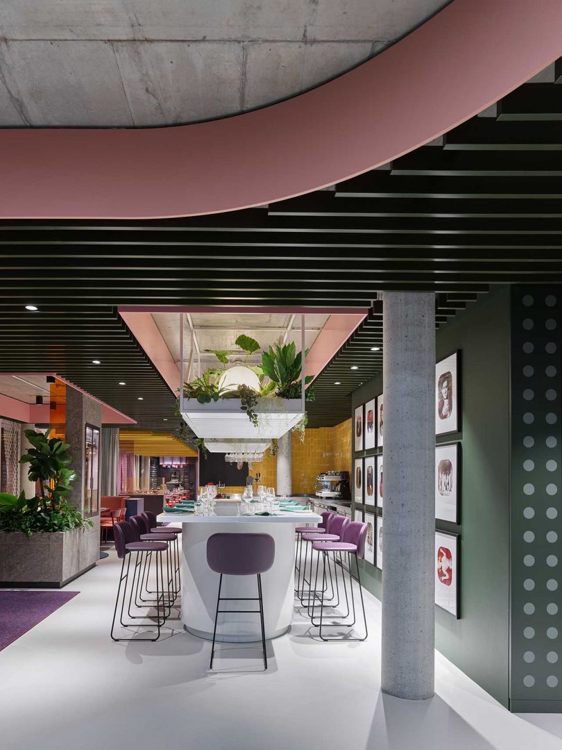 A Restaurant With A Fresh, Colorful Design Featuring Carpet Collages