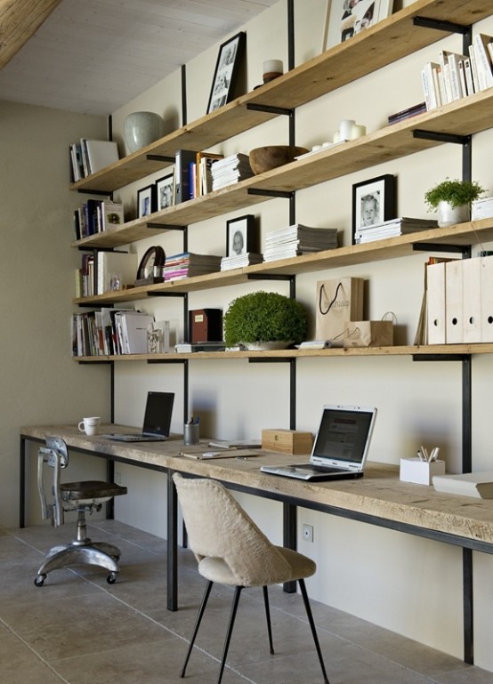 A Modern Rustic Home Office With A Large Open Shelving Unit And A Desk Attached Under Them, Some Chairs And Accessories And Decor
