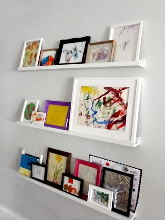 Modern White Ledges Like These Ones Will Show Off Your Kids' Artworks At Their Best - In Frames Or Without Any
