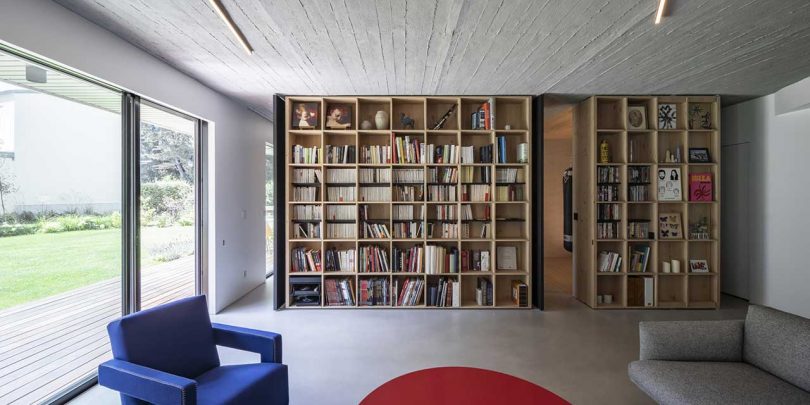 A Renovated Duplex in Paris With Two Rooms Hidden Behind Bookshelves