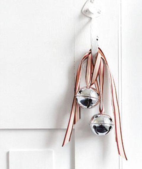 Silver Bells With Striped Ribbons Can Be Hung Not Only A Christmas Tree But Also On Doors